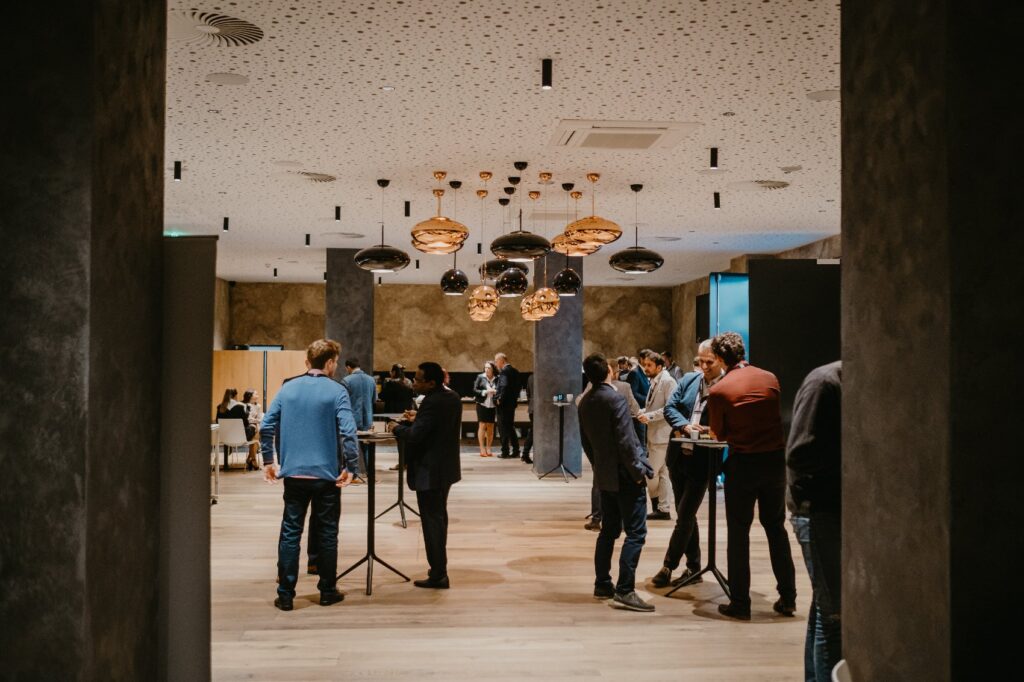 Networking during a corporate conference in central Prague